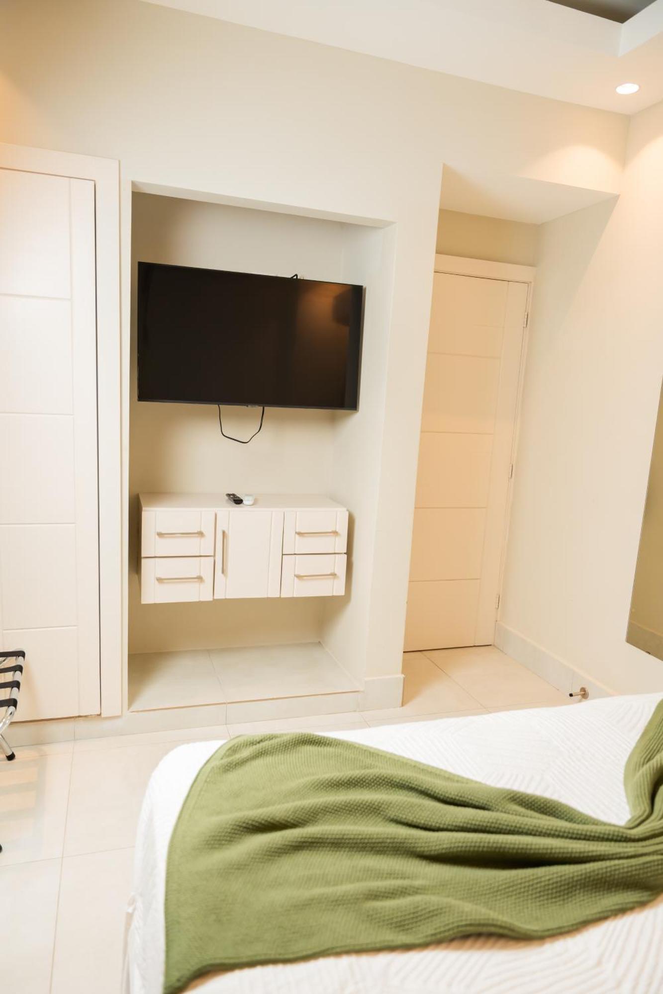 Hotel Stay Here Suites Santo Domingo Szoba fotó